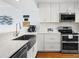 Modern kitchen with white cabinetry, stainless steel appliances, and a stylish countertop at 1502 Marsh Haven, Seabrook Island, SC 29455
