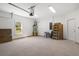 Spacious garage area featuring natural light and ample room for parking and storage at 1518 Stanwick Dr, Johns Island, SC 29455