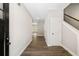 Bright hallway with hardwood floors leads to an open concept living area at 1518 Stanwick Dr, Johns Island, SC 29455