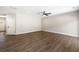 Spacious living room with hardwood floors, a ceiling fan, and neutral paint colors at 1518 Stanwick Dr, Johns Island, SC 29455