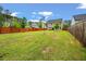 Expansive backyard enclosed by a wooden fence, perfect for outdoor activities at 153 Caleb Ct, Ladson, SC 29456