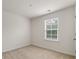 Bedroom with neutral carpet and window at 153 Caleb Ct, Ladson, SC 29456