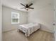Bedroom with neutral carpeting, ceiling fan, and natural light at 153 Caleb Ct, Ladson, SC 29456