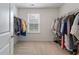 Spacious walk-in closet with window and ample hanging space at 153 Caleb Ct, Ladson, SC 29456