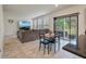Bright dining area next to a sliding glass door that leads to a patio and the living room at 153 Caleb Ct, Ladson, SC 29456