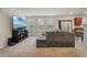 Comfortable living room with television, a large sofa, and a view of the dining area at 153 Caleb Ct, Ladson, SC 29456