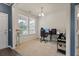 Bright office with carpeted floors, natural light, and modern desk setup at 153 Caleb Ct, Ladson, SC 29456
