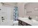 Charming full bathroom with shower-tub combo and modern vanity with white countertop at 1541 Homecoming Blvd, Ravenel, SC 29470