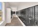 Community mailbox area with brick floors, black mailboxes, and natural light at 1541 Homecoming Blvd, Ravenel, SC 29470