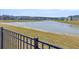 Scenic view of the community pond, enhancing the neighborhood's tranquil atmosphere at 1541 Homecoming Blvd, Ravenel, SC 29470