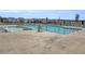 Resort-style community pool with ample seating and well-maintained surroundings at 1541 Homecoming Blvd, Ravenel, SC 29470