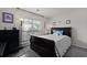 Cozy bedroom with natural light from the window and comfortable gray carpet at 177 Sugar Magnolia Way, Charleston, SC 29414