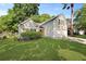 Charming home with a well-manicured lawn, inviting curb appeal, and an attached two-car garage at 177 Sugar Magnolia Way, Charleston, SC 29414
