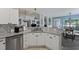 Kitchen area with granite countertops, stainless steel dishwasher, and white cabinetry at 177 Sugar Magnolia Way, Charleston, SC 29414