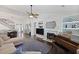 Inviting living room with a fireplace and access to the dining area at 177 Sugar Magnolia Way, Charleston, SC 29414