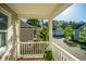 Relaxing balcony view of the neighborhood with lush greenery and beautiful homes nearby at 1865 Towne St, Johns Island, SC 29455