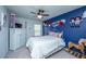 Cozy bedroom with a white bed, rocking horse and colorful accents at 1865 Towne St, Johns Island, SC 29455