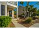 Warm entrance featuring a sidewalk, front door and landscaped front yard at 1865 Towne St, Johns Island, SC 29455