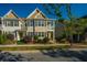Beautifully landscaped townhomes with two-story construction and well-manicured lawns at 1865 Towne St, Johns Island, SC 29455