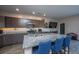 Modern kitchen with an island, granite countertops, stainless steel appliances, and ample cabinetry at 1865 Towne St, Johns Island, SC 29455