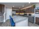 Well-equipped kitchen featuring a granite island, stainless steel appliances, and ample cabinet space at 1865 Towne St, Johns Island, SC 29455