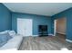 Stylish living room featuring hardwood floors, a double door closet, and neutral décor at 1865 Towne St, Johns Island, SC 29455