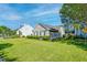 Well-maintained home featuring a lovely lawn and mature landscaping at 1929 Treebark Dr, Charleston, SC 29414