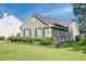 A lovely home exterior highlighting the manicured lawn and tidy landscaping at 1929 Treebark Dr, Charleston, SC 29414