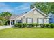 Charming home with well-manicured lawn and inviting curb appeal at 1929 Treebark Dr, Charleston, SC 29414