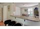 Kitchen featuring a breakfast bar that connects to the dining area, offering convenient seating and serving space at 1929 Treebark Dr, Charleston, SC 29414