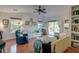 Cozy living room with hardwood floors, vaulted ceilings, and sliding doors leading to the outdoor area at 1929 Treebark Dr, Charleston, SC 29414
