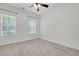 Bright carpeted bedroom featuring a ceiling fan at 1953 Suzanne St, Johns Island, SC 29455