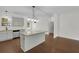 Bright kitchen featuring a center island, stainless steel appliances, and ample cabinet space at 1953 Suzanne St, Johns Island, SC 29455