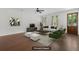 Modern living room featuring hardwood floors, neutral walls, and comfortable seating at 1953 Suzanne St, Johns Island, SC 29455