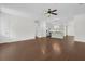 Spacious area with wood floors and views of a modern kitchen with stainless steel appliances at 1953 Suzanne St, Johns Island, SC 29455