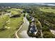 Breathtaking aerial view of a home next to golf course and winding waterway at 20 Old Cedar Ln, Kiawah Island, SC 29455