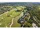 Gorgeous aerial view of a home bordering a golf course and river at 20 Old Cedar Ln, Kiawah Island, SC 29455