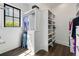 Well-organized walk-in closet featuring custom shelving, drawers, and natural light at 20 Old Cedar Ln, Kiawah Island, SC 29455