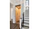 Home elevator next to an open staircase at 20 Old Cedar Ln, Kiawah Island, SC 29455