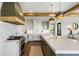 Spacious kitchen featuring a large island, modern appliances, and elegant finishes, ideal for cooking and gathering at 20 Old Cedar Ln, Kiawah Island, SC 29455