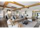Bright living room with an open floorplan, stylish furnishings, and hardwood floors at 20 Old Cedar Ln, Kiawah Island, SC 29455