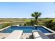 Inviting pool with scenic golf course views, surrounded by lush greenery and serene waters at 20 Old Cedar Ln, Kiawah Island, SC 29455