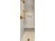 Detailed shower with gold hardware, bench seating, and subway tile at 20 Old Cedar Ln, Kiawah Island, SC 29455