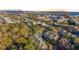 An aerial view of condo community near a stadium, and waterfront park at 200 Bucksley Ln # 302, Charleston, SC 29492