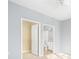 This bedroom showcases a neutral color palette and includes both a closet and an ensuite bathroom at 200 Bucksley Ln # 302, Charleston, SC 29492