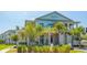 Beautiful multi-story building with a resort-style facade, lush landscaping, and multiple balconies for scenic views at 200 Bucksley Ln # 302, Charleston, SC 29492
