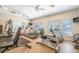 Community gym featuring modern fitness equipment, ceiling fans, and natural light at 200 Bucksley Ln # 302, Charleston, SC 29492