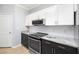 Updated kitchen with stainless steel appliances and granite countertops at 200 Bucksley Ln # 302, Charleston, SC 29492