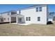 Back of home with a patio and big backyard at 205 W Bradford Pointe Dr, Summerville, SC 29483