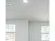 Bright bedroom featuring neutral walls, carpet, and windows providing natural light at 205 W Bradford Pointe Dr, Summerville, SC 29483
